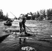 Lenninge. Flottning i Voxna älv.