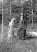Kvinna. Tidsomfånget är 1900 - 1940