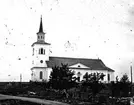 Enångers gamla kyrka. Bilden bilden är tagen före 1879, då kyrkan brann och bara murverket blev kvar.