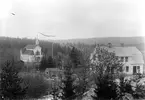 Missionshuset i Skog omkring 1920. I förgrunden handlande Johanssons nybyggda affär.