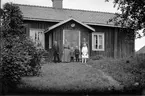 Familjen Larsson i Hästbo, Torsåker. Fr.v.  Georg, Elida, Herbert, Einar, Erik och Ellen.