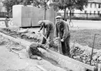 Trottoarläggning

9 september 1946