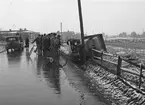 Foto av havererad strömmingsbil

Maj 1939