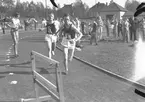 År 1938.Stafettväxling löpning. Stadsloppet. Reportage för Gefle-Posten