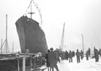 Sjösättning av M/S Trominent. December 1947. Gävle Varv anlades 1873. Efter en konkurs 1921 bildades Gefle Varfvs och Verkstads Nya AB, som bland annat tillverkade oljecisterner och utrustningar till pappersmassefabriker. På 1940-talet återupptogs skeppsbyggeriet.