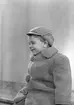 Vinterklädd gosse. L. Haglund & Co, med varumärket Elhå. Grundades som en affär för mössor, hattar och pälsvaror av Lars Haglund 1872.
Den 16 augusti 1951