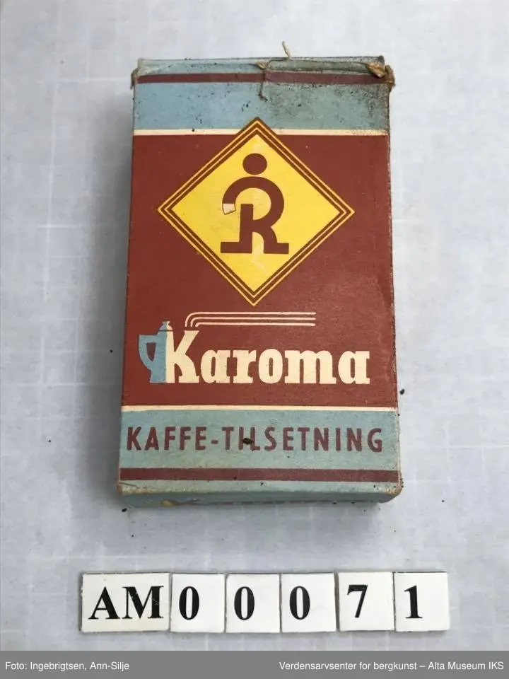 Form: Emballasje til kaffetilsetning. Logoen består av en stor R med prikk over i en gul firkant.