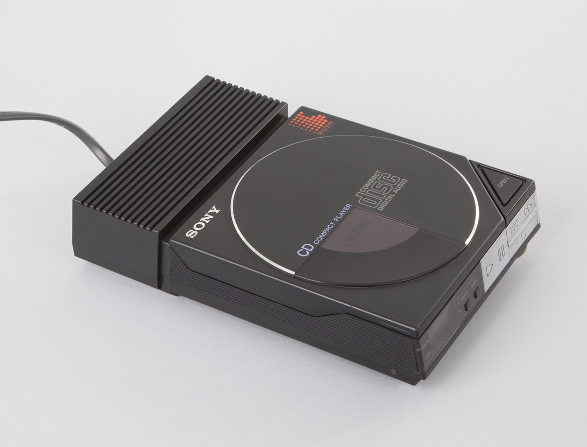 16-bits CD-spiller i sort plastkabinett med ekstern strømforsyning.
