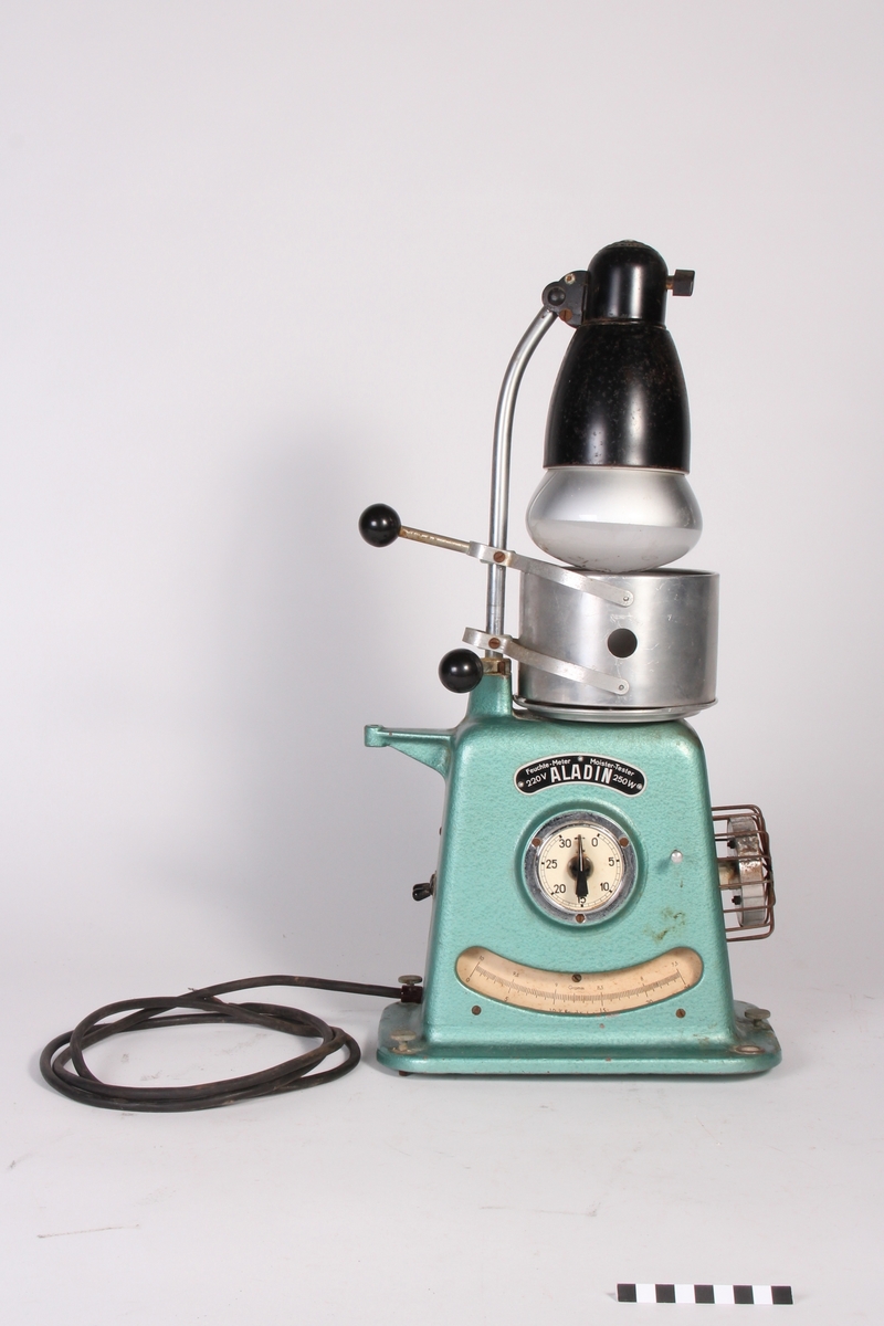 Instrument til å måle fuktighet. Lampe øverst.