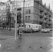 Gävle centrum. Trafikbild med Gevaliapalatset i bakgrunden.