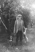 Hedesunda,
Gunnar Lind (Skräddar-Gunnar) med färsk harstek.