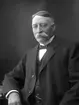 Kvarndisponent.Johan Enok Olsson, Västra vägen 6. Född 1852 i Motorp i Kalmar län. Död 1936. Uppgifter ur: Handels-Societeten i Gefle. av C.B. Berggren.