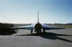 Ett flygplan J 35 från F 3 står på flygfältet på Malmen, 1973. Vy bakifrån.