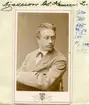 Porträtt av kamrer Axel Ajaxson. Under åren 1878-1892 i tjänst vid  Träförädlingsaktiebolaget i Linköping. Från 1893 vid Östgöta hypoteksförening.