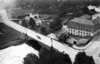 Drottningbron i fågelperspektiv. Valskvarn. Västra kvarnen byggdes på 1730-talet, förstördes i stadsbranden 1869. AB Gefle Valsqvarn bildades 1896 och byggde samma år en ny kvarn.