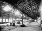 Byggherre: Byggnadsaktiebolaget Contractor, Stockholm General Motors Nordiska AB:s första fabriksbyggnad i Sverige. Arbetsbild. Hammarbyhamnen 1927.