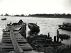 Gamla fiskehamnen i lågvatten. Längst upp till vänster lotsplatsen.