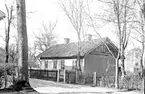 Skara. 
Kvarteret Rådhuset.
Huset på  Tomt 86, Rådhuset 4, vid Rådhusgatan före ändringen våren  1926.