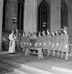 Skara Lottakår.
Lottainvigning i Domkyrkan 10/2 1963. Pastor Yngve Levenskog talar till de nyintagna lottorna.