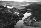 Spångan, Gullspångsälven med landsvägsbron i Kärret och kraftverket.