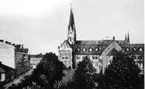 Skara, Järnvägsgatan, läroverket och domkyrkan.