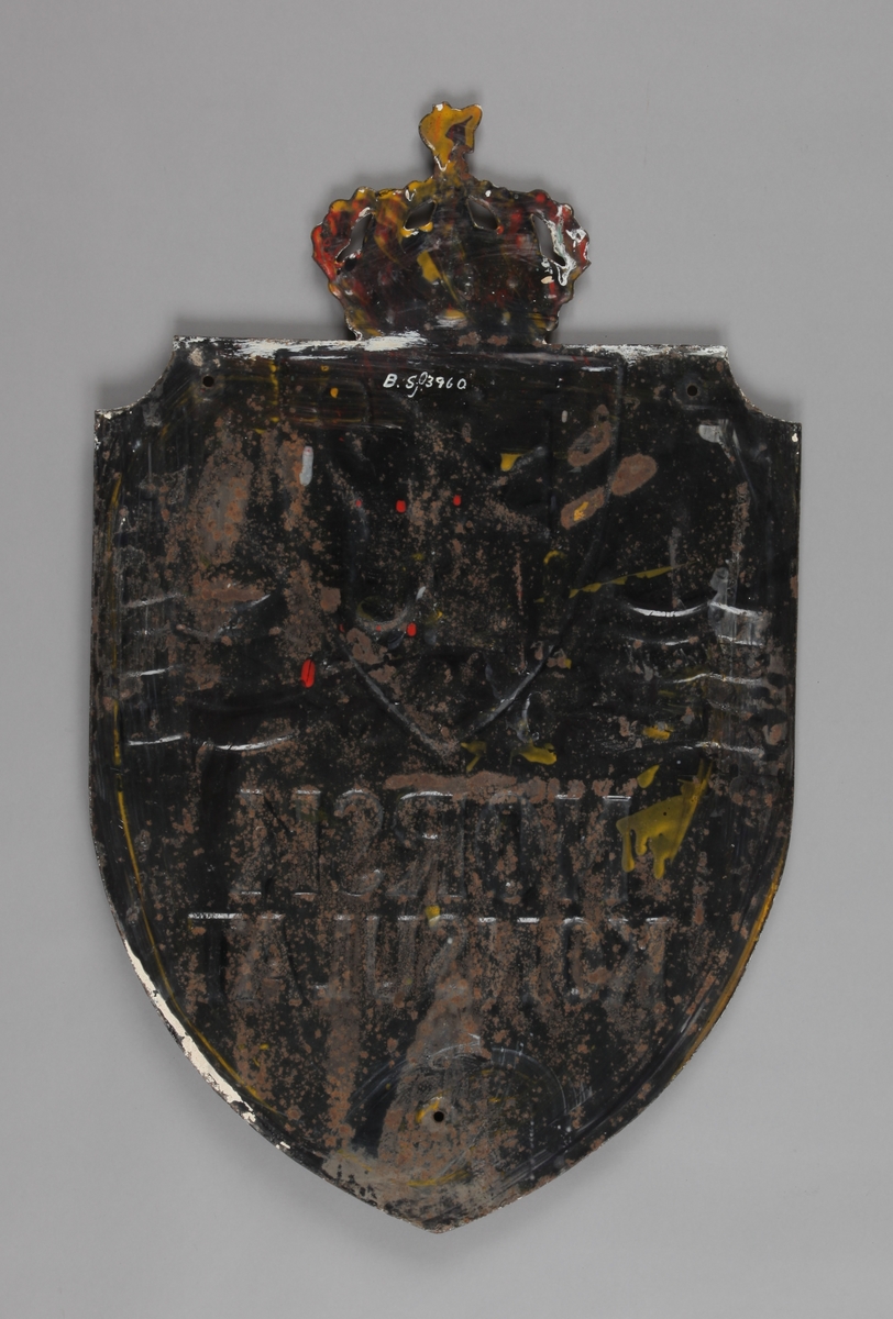 Skilt med det norske riksvåpen motiv.