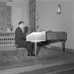 Ny cembalo i Bomhus kyrka inviges. April 1960.