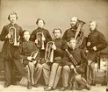 Gruppfoto av Uddevalla Skarpskyttekårs musikkår.