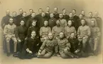 Grupporträtt av officerare och soldater 1915-1925.