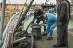 Isbrytaren Sankt Erik i dockan på Beckholmens varv för bottenöversyn och målning.