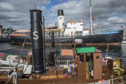 Stockholm Steam på Galärvarvet. I förgrunden bogserbåten Örn