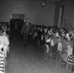 Karlsborg, mannekänguppvisning i Realskolans aula 1960. Endast neg finns.