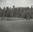 Soldater från Södermanlands regemente I 10 samlade på fält.