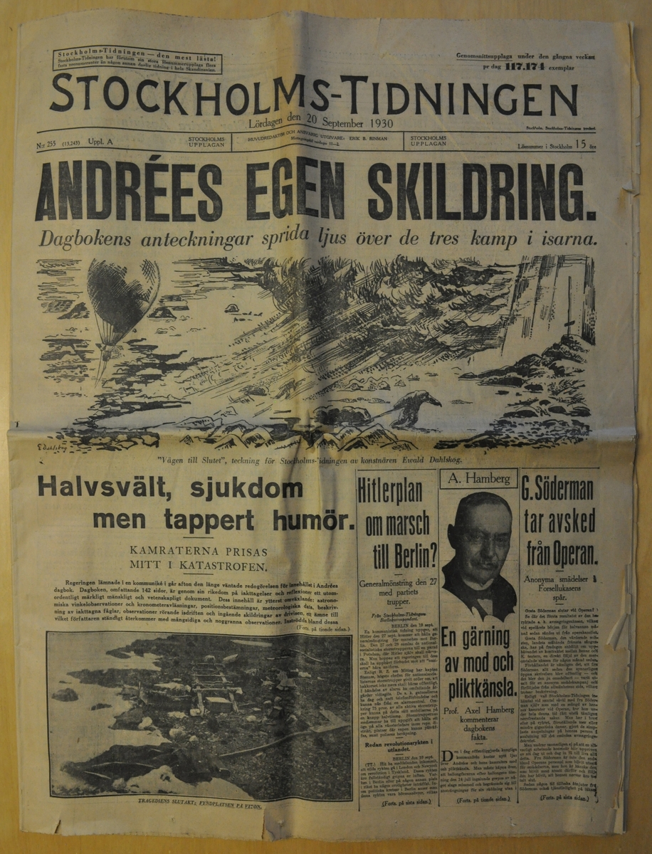 Stockholms-Tidningen. Omslag med illustration av Ewald Dahlskog föreställande ballongen Örnen på väg, en man som drar en kälke samt Vitön med ett kors. Rubrik: "Andrées egen skildring".