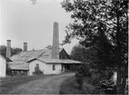 Smedja innehållande tre stycken vallonsmälthärdar samt två lancashirehärdar, Älvkarleö Järnbruk (Elfkarleö Jernbruk), 1929.