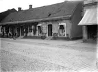 Utetagning vy 1920. CO Borgs söner fabriker garn och vävnadshandel Algatan vid nuvarande systembolaget.