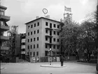 Flerbostadshus i korsningen S:t Johannesgatan - Kyrkogårdsgatan under uppförande, Uppsala 1944