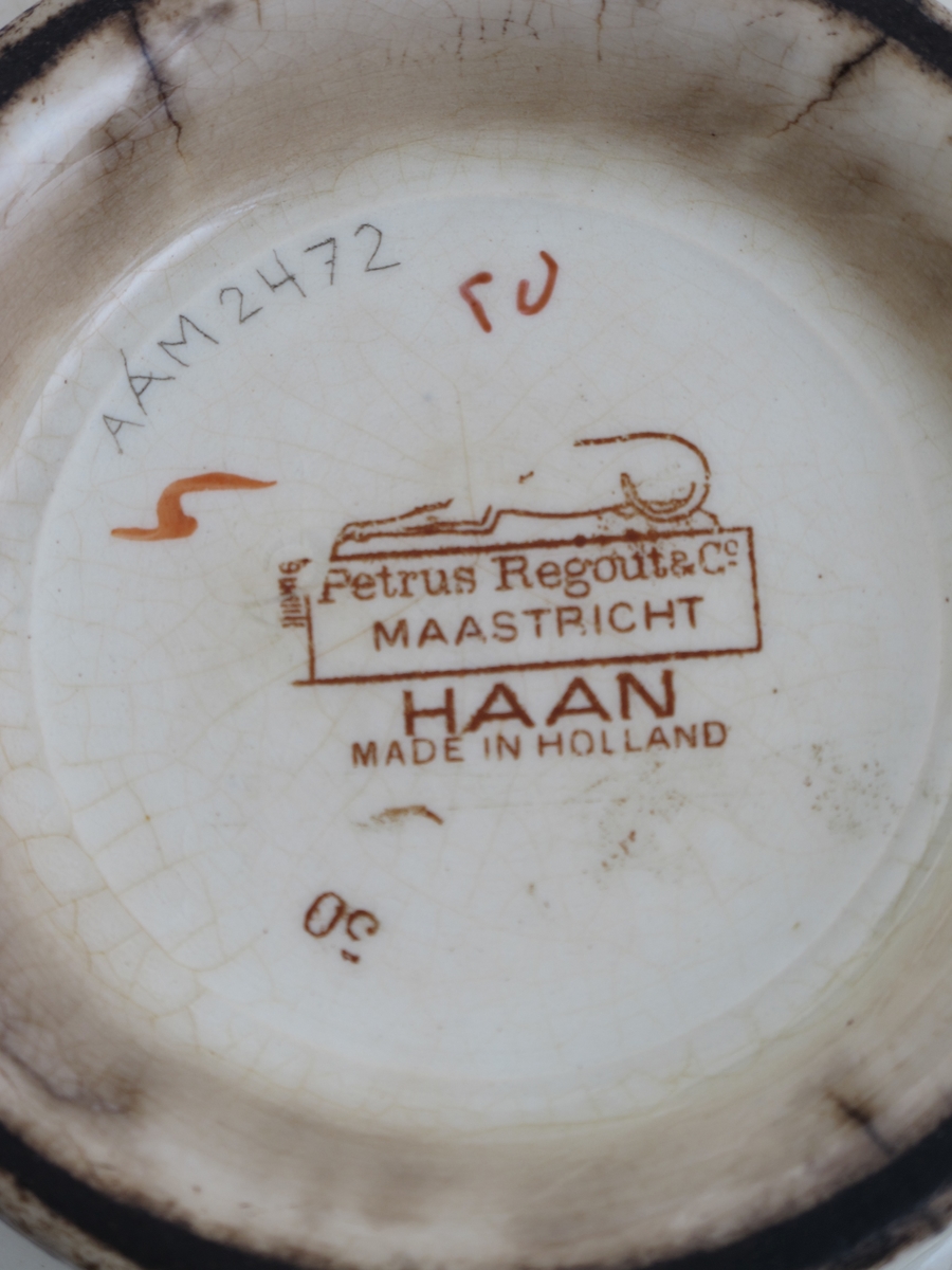 Haan (hane)./ hane og lilje.