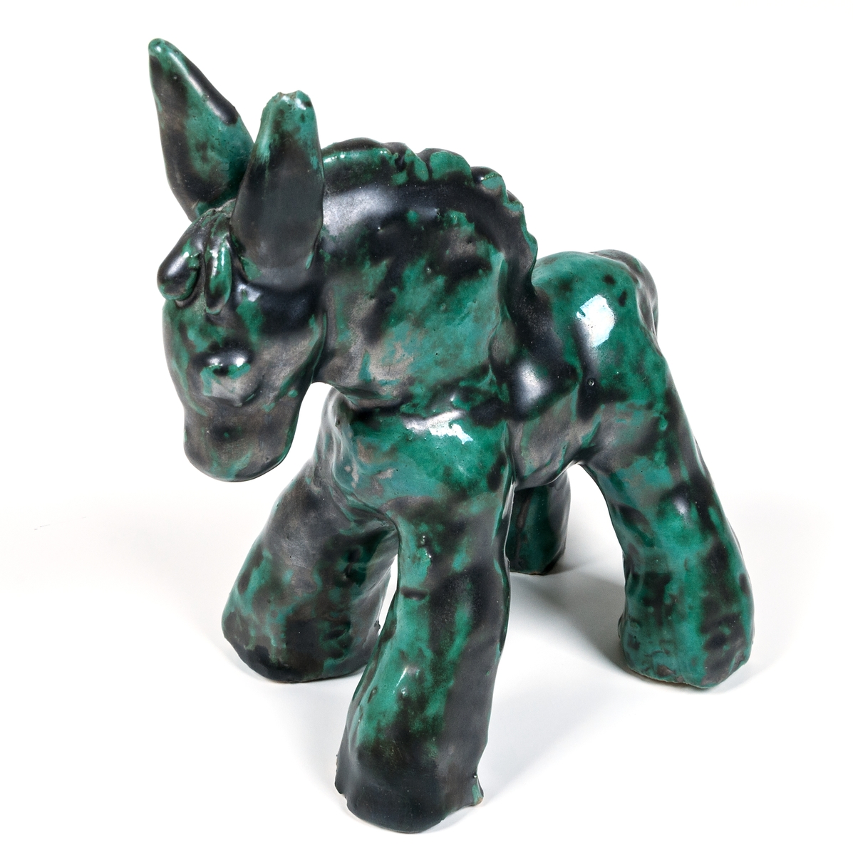 Figurin, mulåsna, lergods, grönsvart glasyr, formgiven av Märta Willborg, 1930-talet.