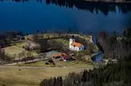 Flygfoto över Sandhems kyrka i Mullsjö kommun.