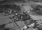 Flygfoto över Näshult i Vetlanda kommun. Nr. M. 917