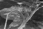 Flygfoto över Vaggeryds massafabrik i Vaggeryds kommun, Nr. C. 1704