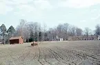 Jordbruksarbete på Åby, Valbo I bakgrunden ser man Åby gård