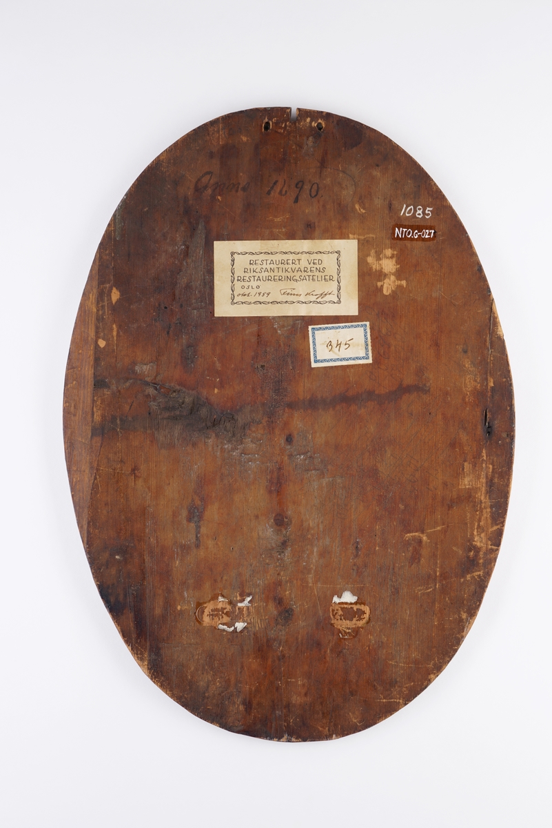 Skiltets motiv viser det kongelige tolltegnet av 1815. I motivet er unionsflagget, riksvåpenet,merkurstaven og triforken samt et skip lastet med tønner. På land er tønner og en kiste.