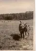 Marsch till fots , häst med hästskötare 1920-tal