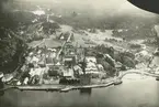 Exteriör. Flygfoto över Gustavsbergs fabriksområde med omnejd. Sannolikt från 200 m höjd.