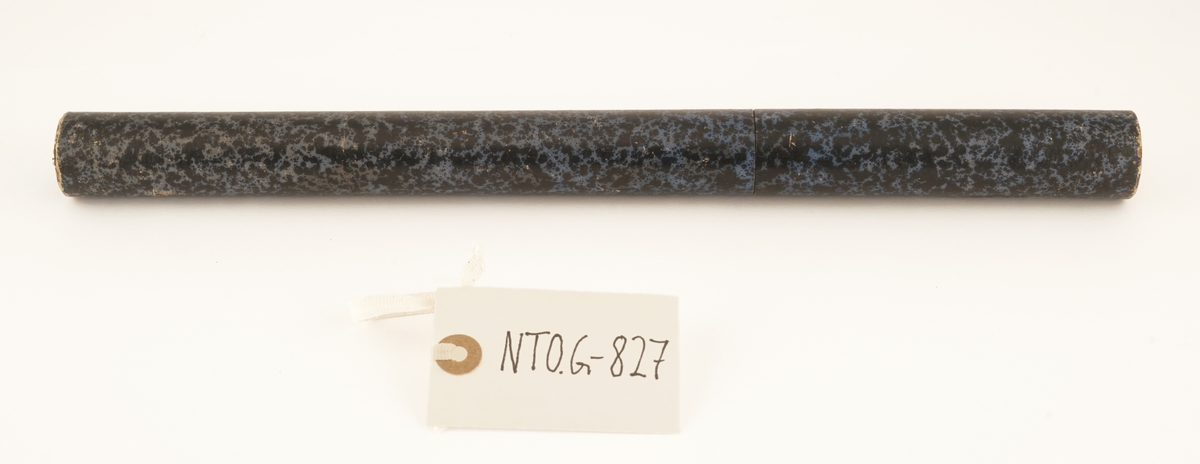 Flytevekt av glass  som ligger i et rundt etui av formentlig papp.