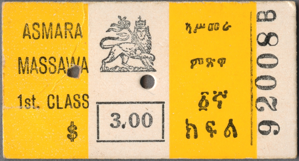 Edmonsonsk biljett av gul/vit-randig kartong med tryckt svart text:
"ASMARA MASSAWA
1 st. CLASS $ 3.00".
Biljetten, som är Eritreansk har texten på långsidan, förutom biljettnumret "92008B". Den har breda ränder på kortsidan. I mitten finns en tryckt symbol som föreställer ett lejon, med en krona över huvudet och hållande i en stav. Texten till höger på biljetten är tigrinska vilket är det officiella språket i Eritrea. Det finns två hål efter biljettång och på baksidan står datumet "30 APR 1969" stämplat. 

Historik: Asmara är huvudstad i Eritrea och trafikknutpunkt med järnväg till hamnstaden Massawa vid Röda Havet. 

Källa: Wikipedia, 2016-07-05.