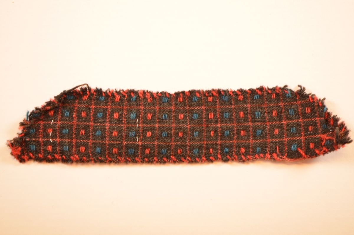 Stoffbitar, seks forskjellige bitar av ruta ulltøy. A, b,c,d,e,f.