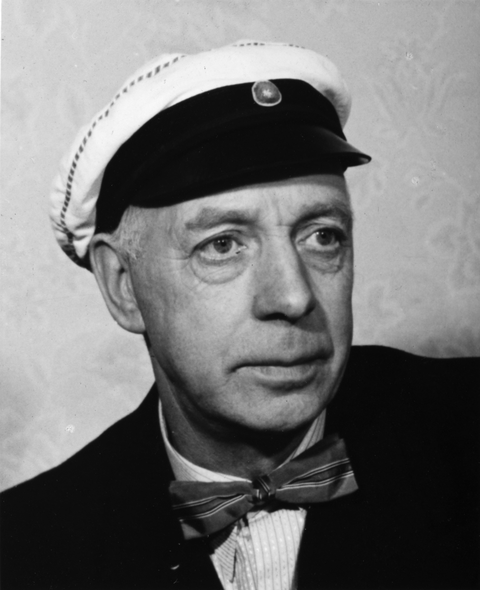 Portrett Peter Dahl med sangerlue.